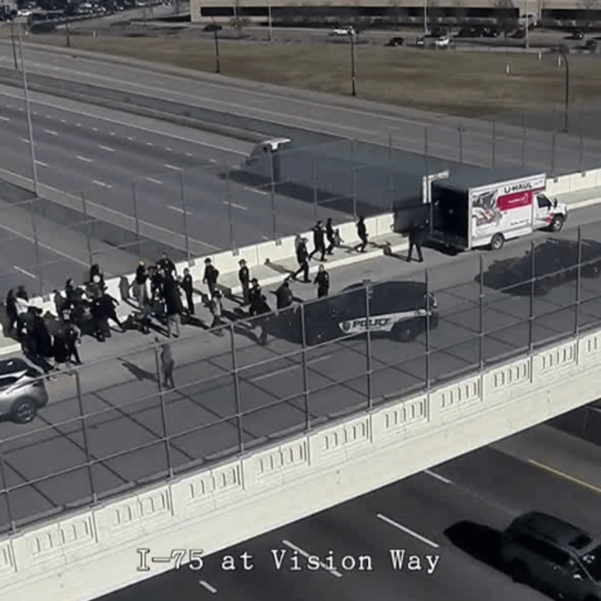 Neo-Nazi wave flags above overpass in Cincinnati, Ohio.