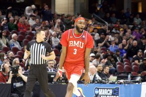 Amarion Dickerson celebrates after scoring against Alabama in the first round of March Madness last Friday Photo credit: Malena Kaniuff